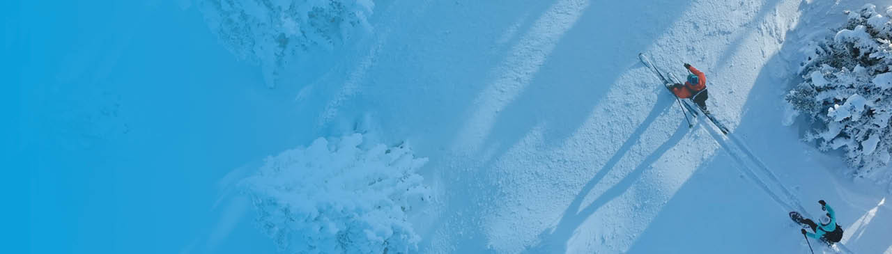 a young family in front of a countryside cottage