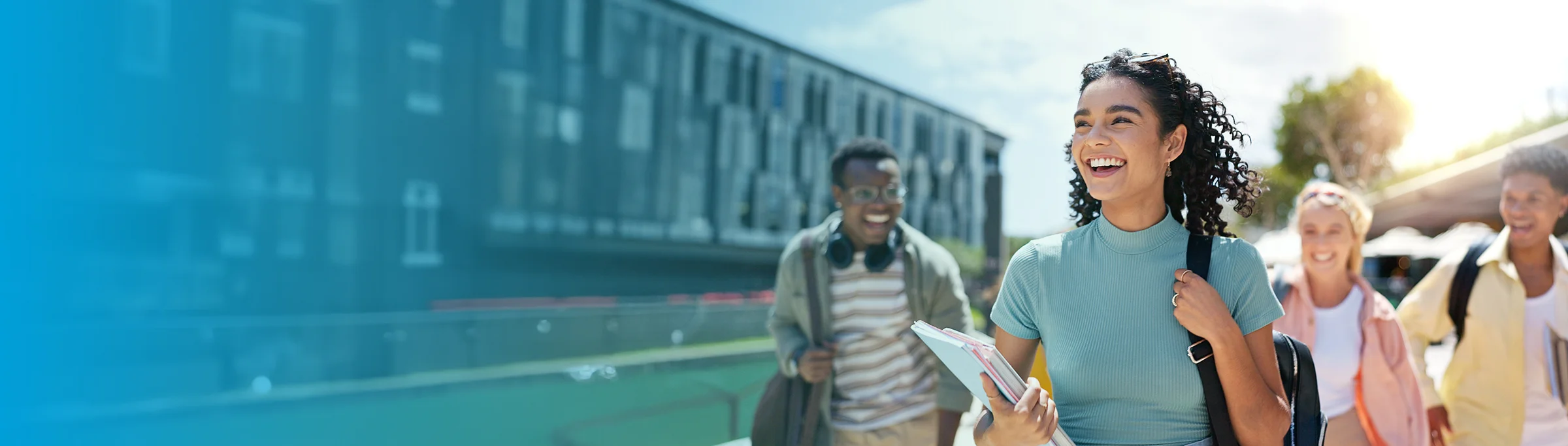 a smiling young woman at university