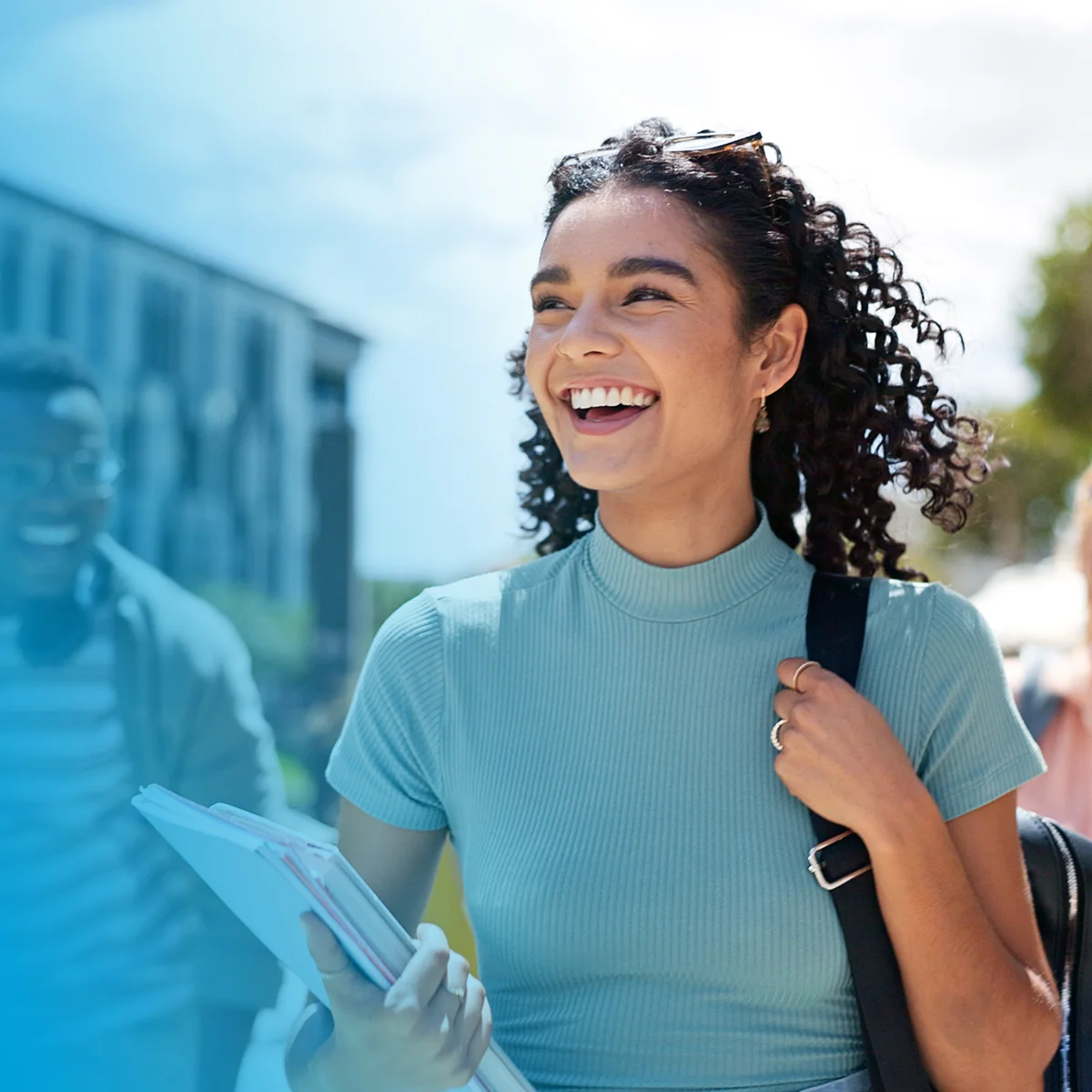 a smiling young woman at university